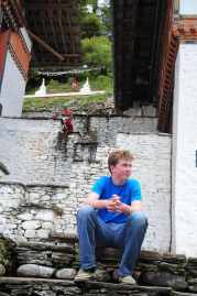 Contemplating why he has to sit for another picture.