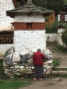 Placing Offerings (berries) on the Chorten